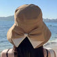 👒 Damen Sonnenhut mit breiter Krempe & dekorativer Schleife, faltbarer atmungsaktiver Stoff mit 360° UV-Schutz für Strand, Garten und Urlaub ✨